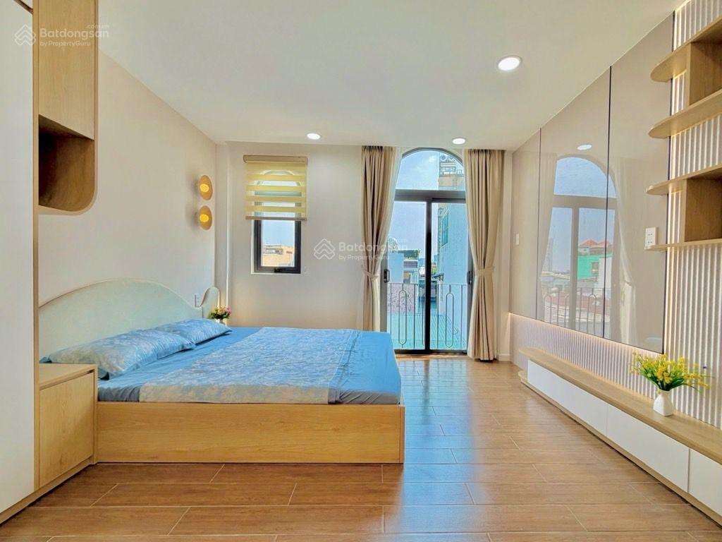 Nhà mới xây 4 tầngngay cầu bôngbình thạnh cạnh quận 1,quận 3. sát đường trường sachợ bà chiểu