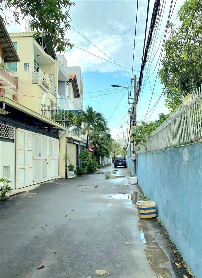 Bán nhà 2 mặt tiền trướcsau hẻm xe hơi thông đường dương quảng hàm gò vấp(6mx16.3m)giá 12.5 ty tl