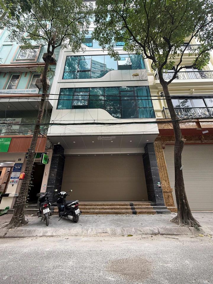 Cho thuê nhà trần vỹ	dt 70m, 7 tầng, mt 5m, thông sàn, thang máy + vs cuối, có đh	, nhà đẹp giá 43