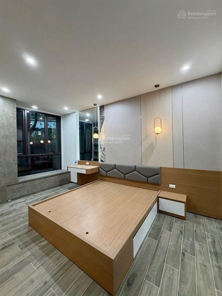 Ngọc lâm 82m2  6 tầng thang máy  phân lô vip  gara 2 ô tô 7 chỗ