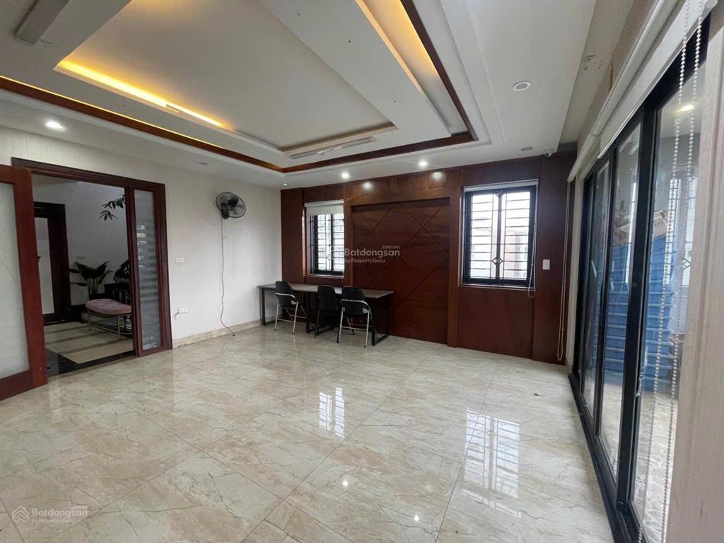 Chủ ngộp bank bán gấp tòa nhà văn phòng đình thôn 77m2 7 tầng thang máy, mt 5.7m