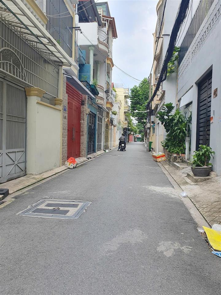 Cần bán nhà trệt lầu đường đồng đen phường 14 tân bình. dt 7 x 15m ngay khu bàu cát