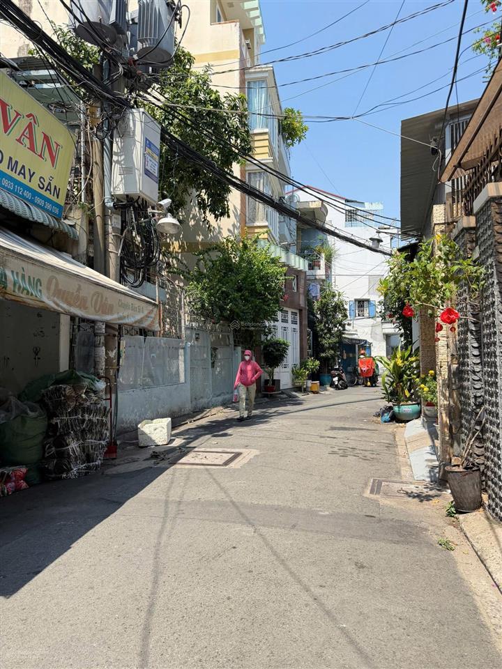 Nhà 4 tầng hẻm xe hơi lạc long quân,tân bình. gần giáo xứ phú trung giá 6.35 tỷ.