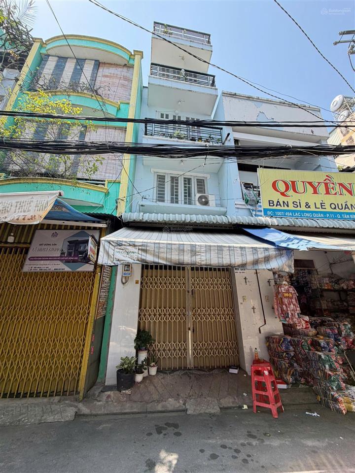 Nhà 4 tầng hẻm xe hơi lạc long quân,tân bình. gần giáo xứ phú trung giá 6.35 tỷ.