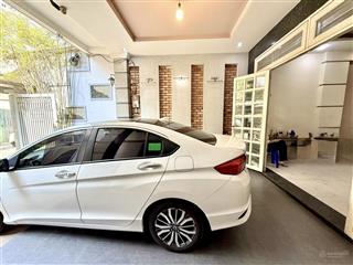 Mặt tiền đường nhựa tân bình  gần chợ phạm văn hai  dt 133m2  ngang 6.1m nở hậu  dài 24m