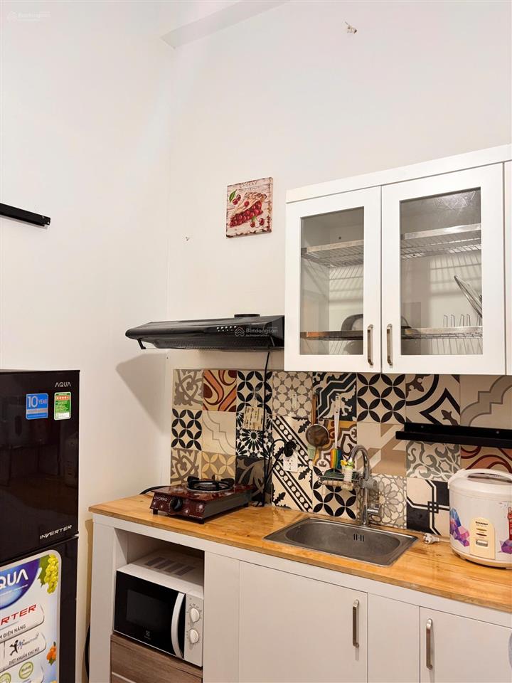 Bán chdv ngay q1  4 tầng 70m²  nở hậu 4,75m phan văn hân