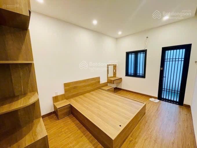 Bán toà nhà 3 tầng 1 tum mt lê quảng chí trục kinh doanh sầm uất  có tl