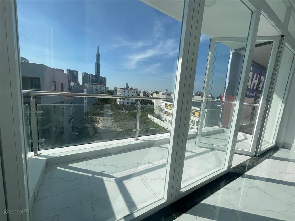 Cho thuê tòa nhà văn phòng hầm 5 lầu đường d7  giá 55tr/tháng