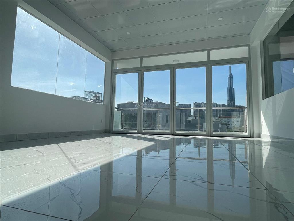 Cho thuê tòa nhà văn phòng hầm 5 lầu đường d7  giá 55tr/tháng