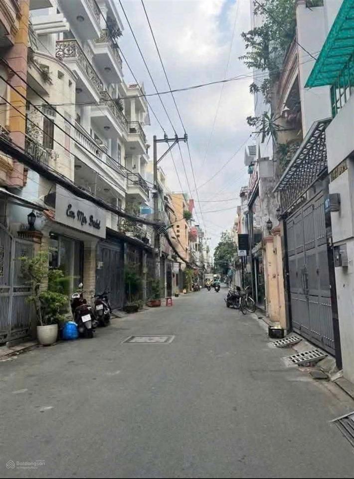 Hxh nguyễn kiệm p3 dt 5x20m nở hậu 7m 1 trệt lửng 2 lầu st giá tốt 12.3 tỷ