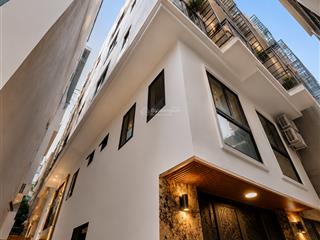 Toà chdv láng hạ, 73m2*7t, mt 6.5m, 24 phòng kk, lô góc, ngõ 3m, đủ gpxd/pccc, dòng tiền 7%/năm!