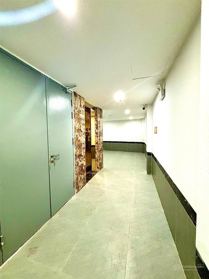Toà chdv đào tấn 90m2*8t, mt 7.5m, 28 phòng kk, lô góc, gần phố, đủ gpxd/pccc, dòng tiền 8%/năm!