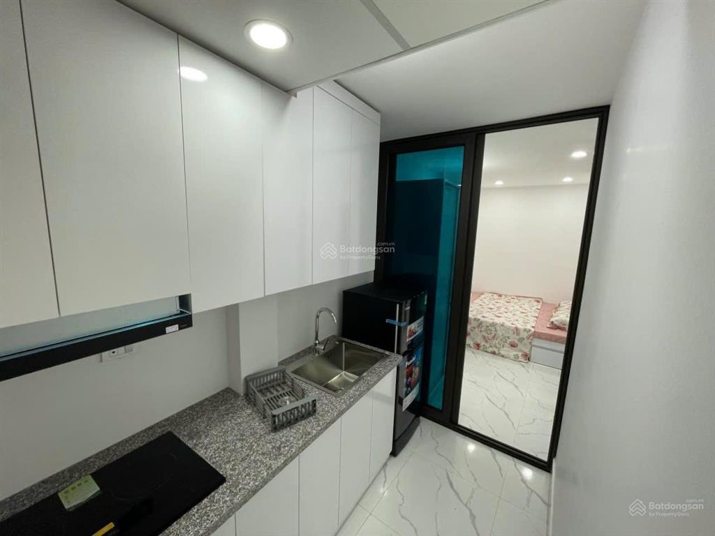 Tòa chdv xuân thủy, 77m2*7t, mt 12m, sát đh quốc gia, 25 phòng kk, đủ gpxd/pccc, dòng tiền 7%/năm