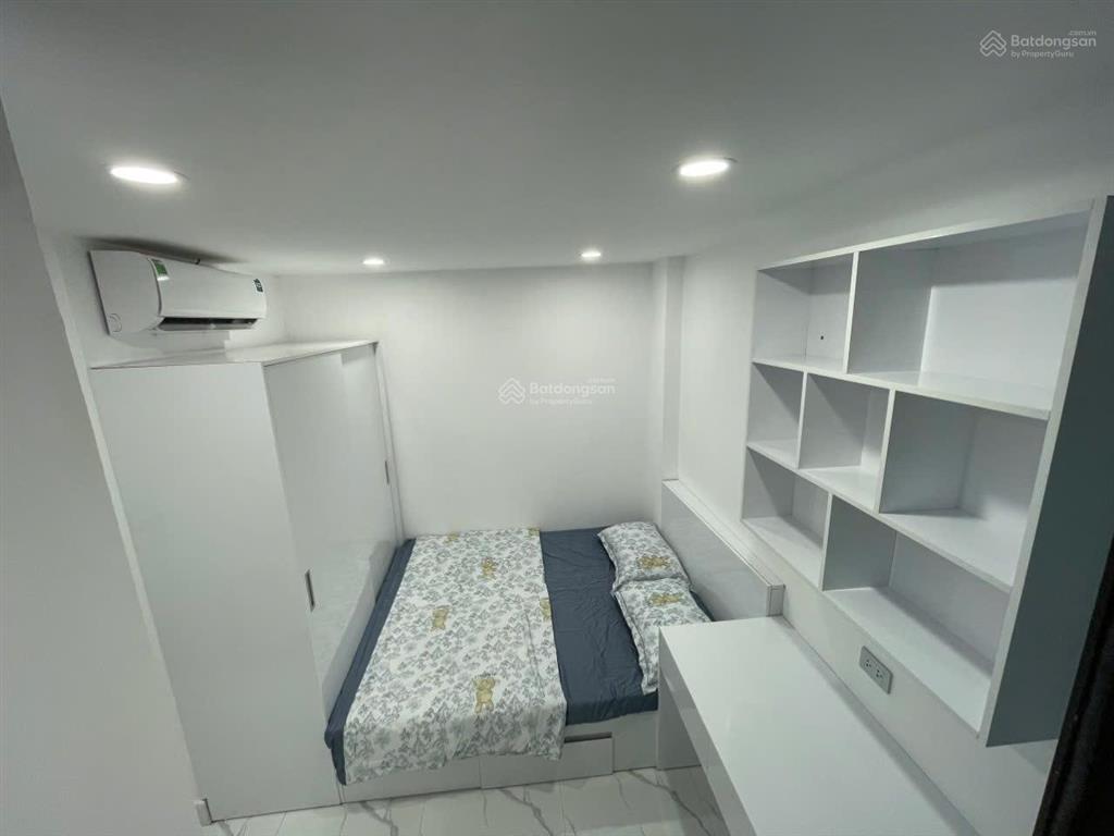 Tòa chdv xuân thủy, 77m2*7t, mt 12m, sát đh quốc gia, 25 phòng kk, đủ gpxd/pccc, dòng tiền 7%/năm
