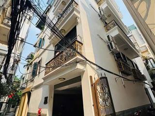 Ngay hồ tây  lạc long quân  lô góc  7 tầng thang máy  cách ô tô 20m  dòng tiền 50tr/tháng