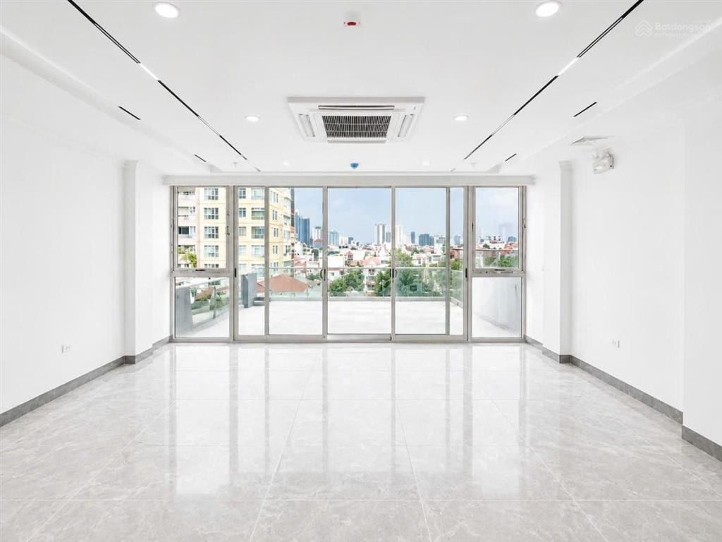 Hạ 3 tỷ! tòa nhà mặt phố thái thịnh. dt48m2 x 9 tầng, gpxd, pccc, ôtô 2 chiều, hè rộng. giá 39.5tỷ