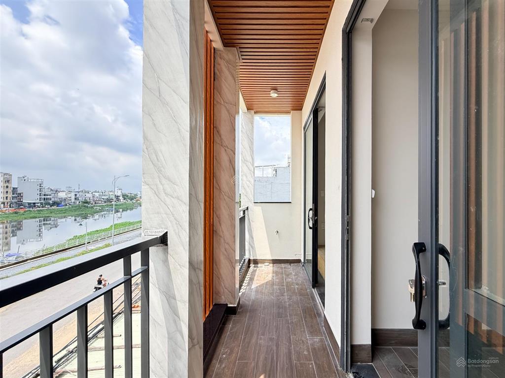 Giảm 25% tháng đầu  ccmn 2pn 1pk ban công view sông 60m2  full nt máy giặt riêng  gần iuh  vlu