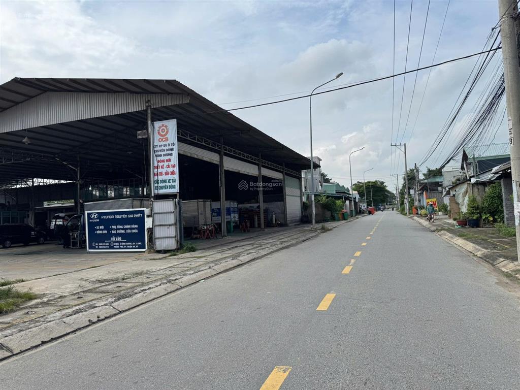 Hai mặt tiền 1000,1m2 (20x50) đường xe tải xây kho  biệt thự thông ql13 và bờ bao sông sg  giá rẻ