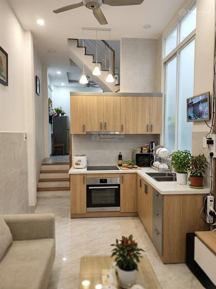 Bán gấp nhà hẻm nhựa xe hơi đỗ xuân hợp 4 tầng 4 pn  7.5 tỷ