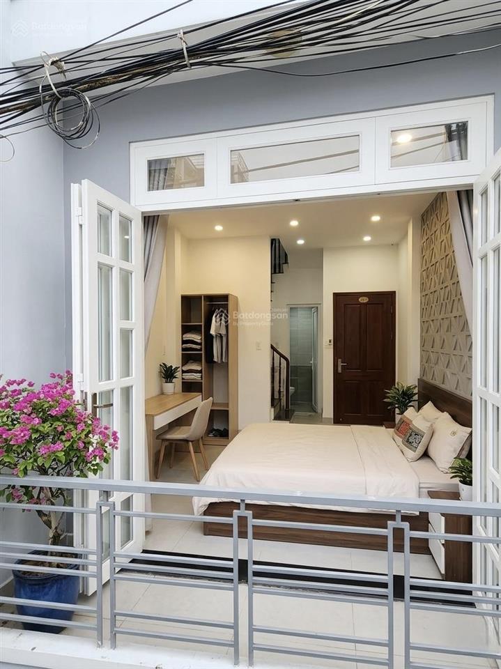 Bán gấp nhà hẻm nhựa xe hơi đỗ xuân hợp 4 tầng 4 pn  7.5 tỷ