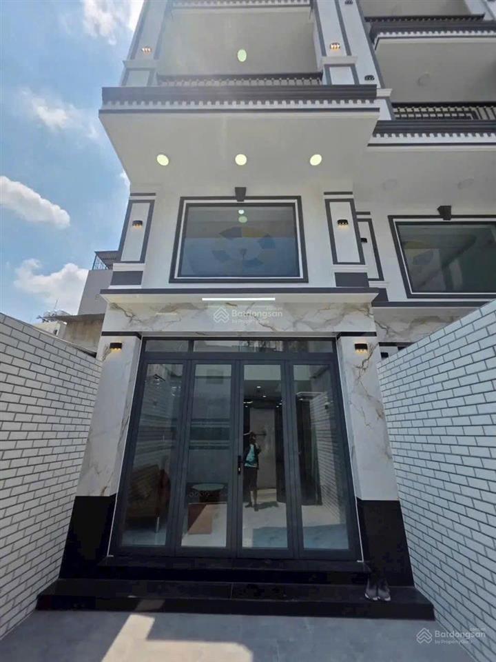 Bán nhà đẹp 1 trục hxh 4 lầu thang máy, dt 63m2 emart dương quảng hàm p5, tn 30tr/th, nhẹ 9 tỷ tl