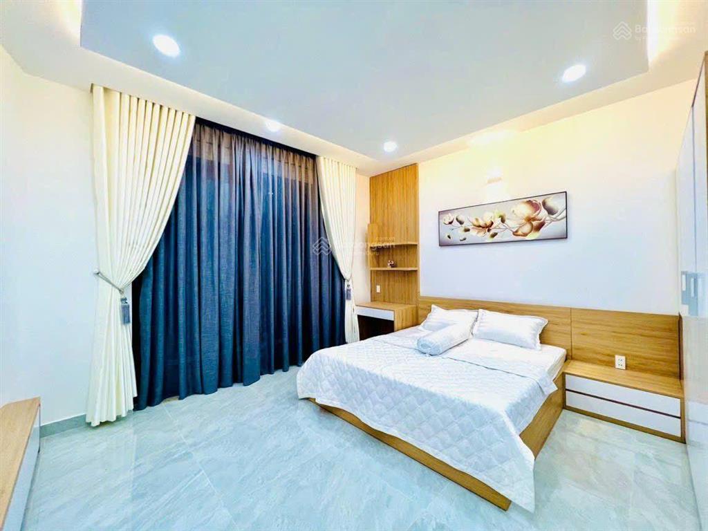 Nhà 5 tầng  77m2  ngay sau căn mt quang trung  giá 12.5 tỷ
