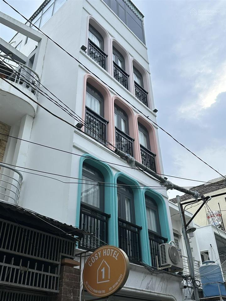 Ngợp cosy hotel, canh emart phan văn trị, xây 5 lầu(12 phòng) .khai thác 150tr/th chỉ 13.9 tỷ