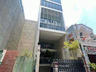 Giãm 15 tỷ! cần bán tòa nhà mặt tiền q. phú nhuận (dt 8x20m  hầm 6 tầng), hđt 250 triệu, giá 65 tỷ