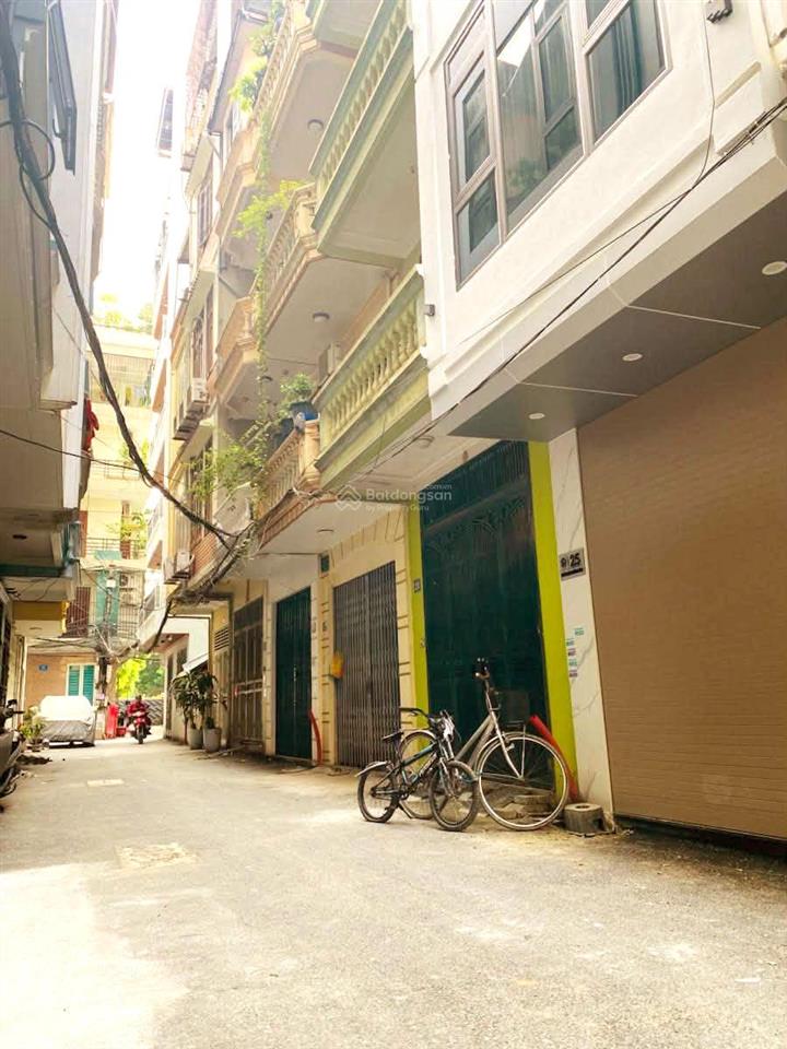 2 thoáng  ô tô đỗ cửa  bán nhà láng  giáp cầu giấy  5 tầng  thang máy  dt 36/43m.