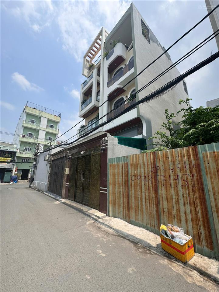 Số 496/32 dương quảng hàm p6  hxt thông 68m2 gpxd 1 trệt, 1 lửng, 3 lầu, st