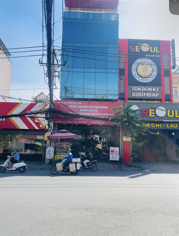 Hạ 7 tỷ! bán gấp building ốp kính mt phan văn trị, gò vấp, (7m x 22m), hầm + 7 tầng, giá 38 tỷ