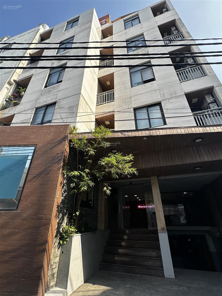 Bán tòa building ngay công viên gia địnhhồng hà, mt ngang 12m x 14m, 7 tầng, hđt 120tr, giá 36 tỷ