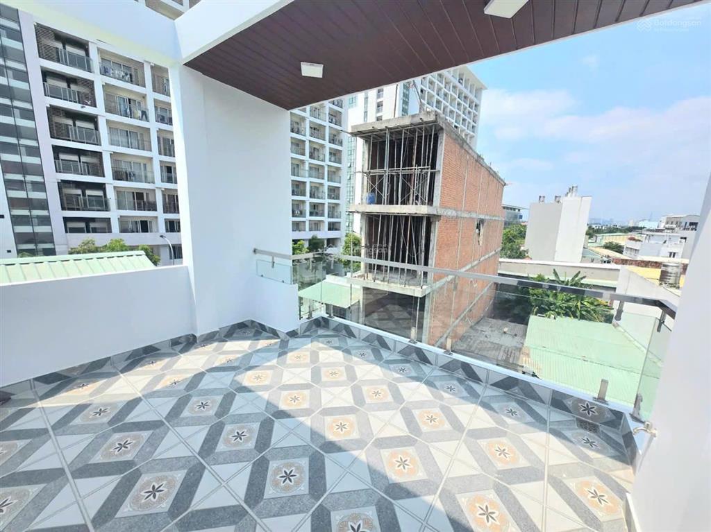 Nhà 4 tầng, hẻm xe hơi, ngay trường đại học tài chính marketing giá 6,6 tỷ/65m2