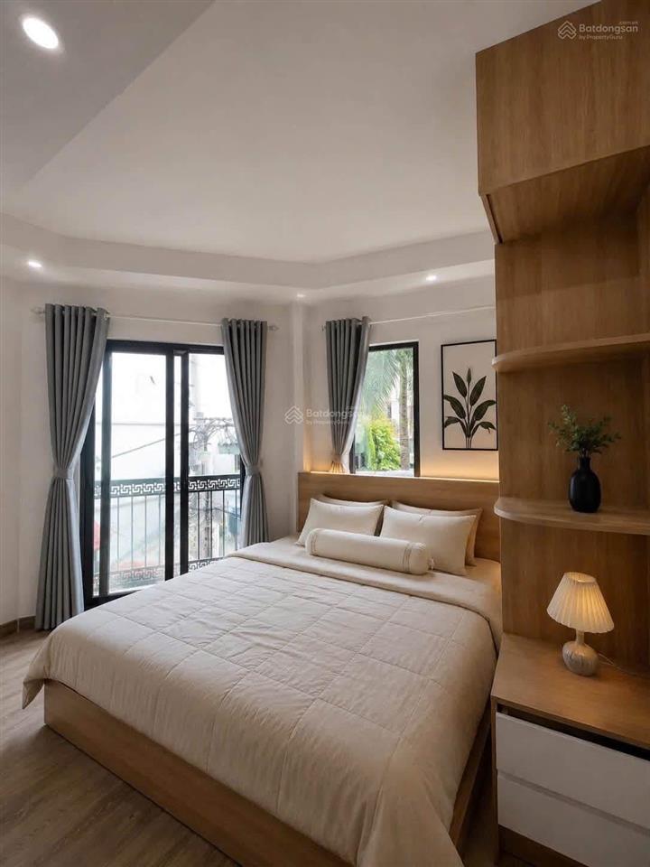 Lo góc trung kính 120m2 x 8tầng thăng máy tổng 28pkk dòng tiền 200tr/th giá 29.9tỷ, sát 2.5