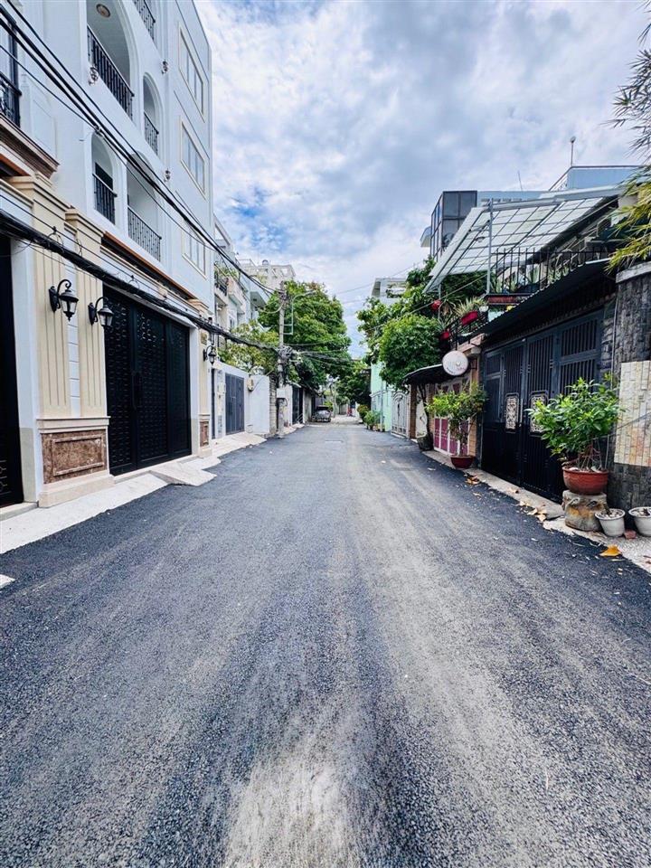 Bán chdv full nội thất. mới xây 8 tầng. 8x21m. lê quang định. p7. bt. 27pn