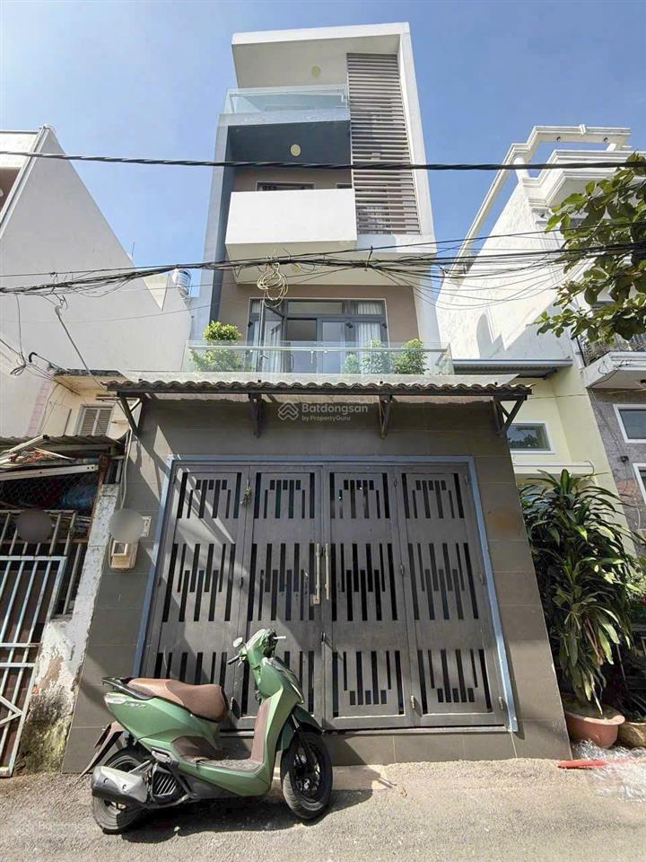 Bán nhà gần mt dương quảng hàm, trệt 3 lầu, giá 8.6 tỷ
