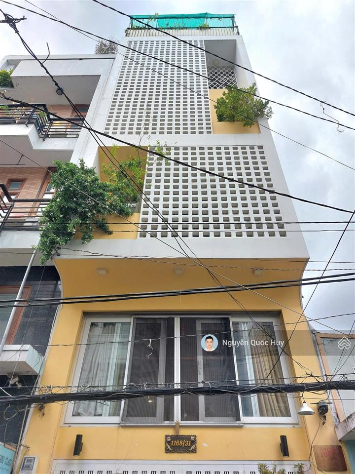 Nhà đẹp 5 tầng sát trường sa  ô tô ngủ nhà  58m2 chỉ 14,x tỷ