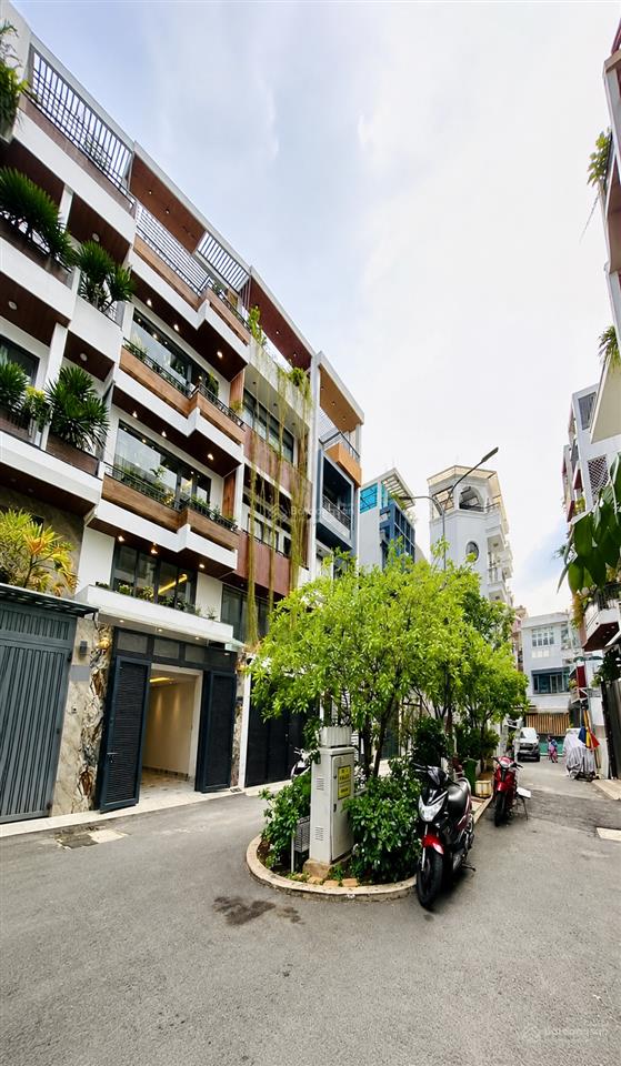 Nhà đẹp 5 tầng, hẻm 8m quang trung, dt 4m x 16m  giá 10,6 tỷ tl