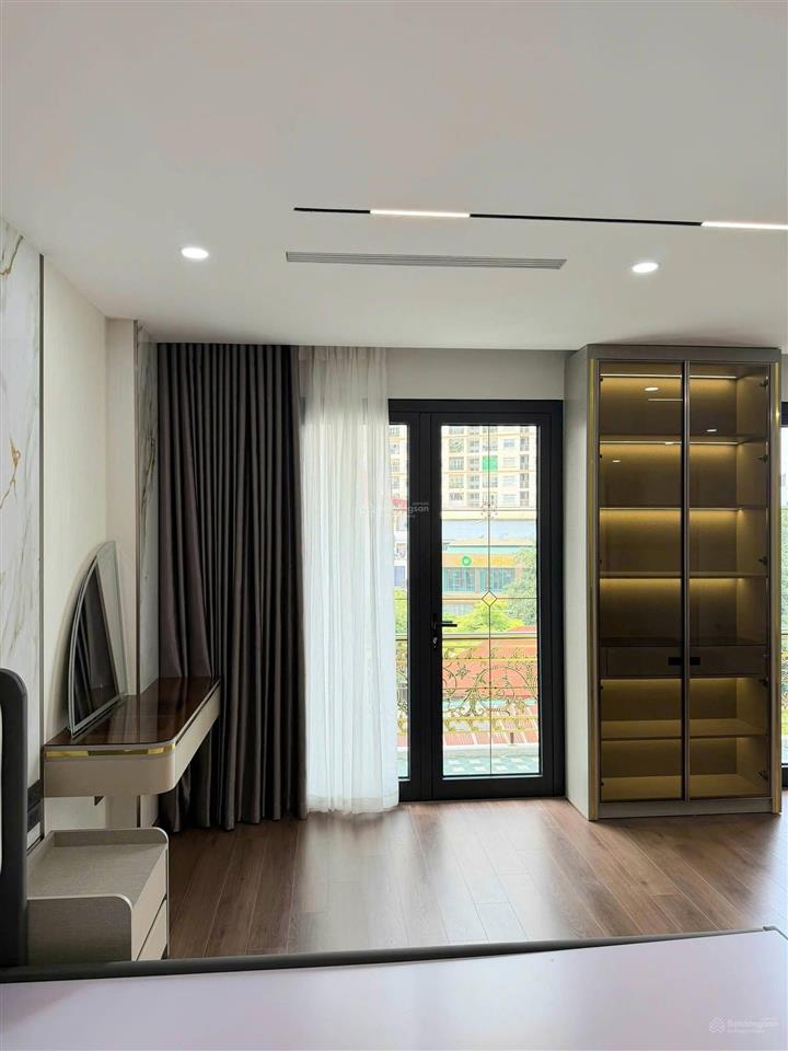 Bán tòa nhà phố minh khai, lô góc, 100m2 x 8 tầng, ô tô tránh vào nhà, vừa ở vừa làm văn phòng