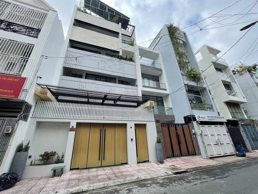 Giảm 2 tỷ. tòa nhà mặt tiền văn phòng khu sân bay  hầm 5 tầng  diện tích sàn 321m²  giá đầu tư