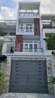 Nhà 3 lầu, ngay vincom đường lê văn việt, quận 9 gần mặt tiền, có sổ sẵn  sang tên ngay. giá 6tỷ50