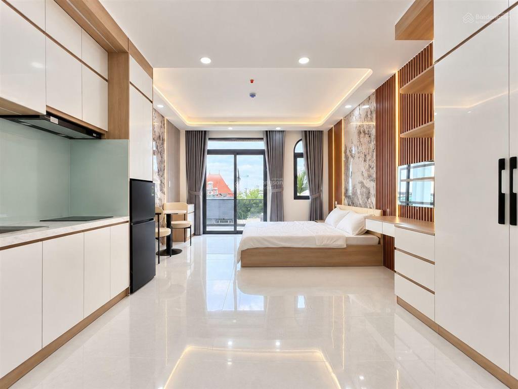 Cho thuê căn hộ ban công, máy giặt riêng 38m2 mới 100% ở đường vạn kiếp gần chợ bà chiểu, quận 1