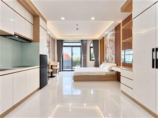 Cho thuê căn hộ ban công, máy giặt riêng 38m2 mới 100% ở đường vạn kiếp gần chợ bà chiểu, quận 1