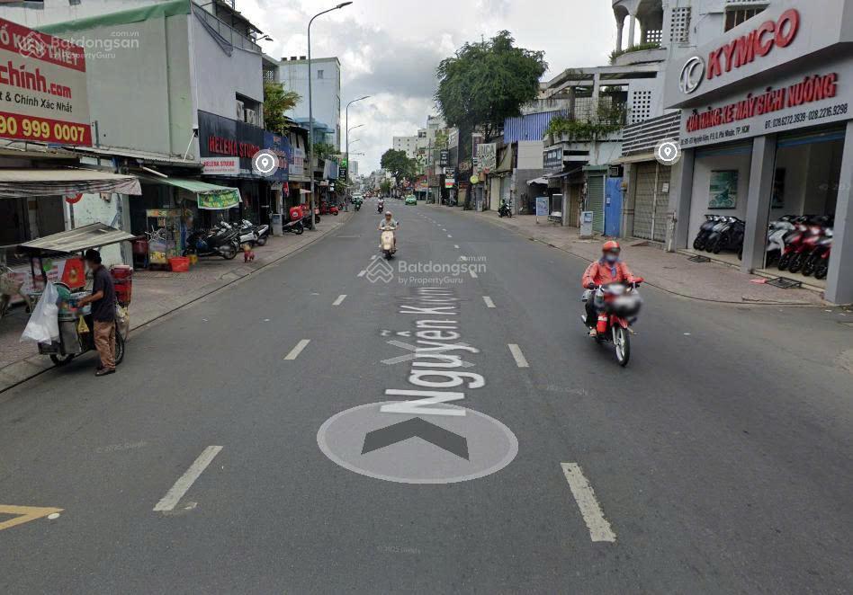 Cc bán gấp nhà 2 mt số 696 nguyễn kiệm, dt 5,2x15m,cn 69,7m2,đct 30 triệu giá 12 tỷ,  0919 818 ***