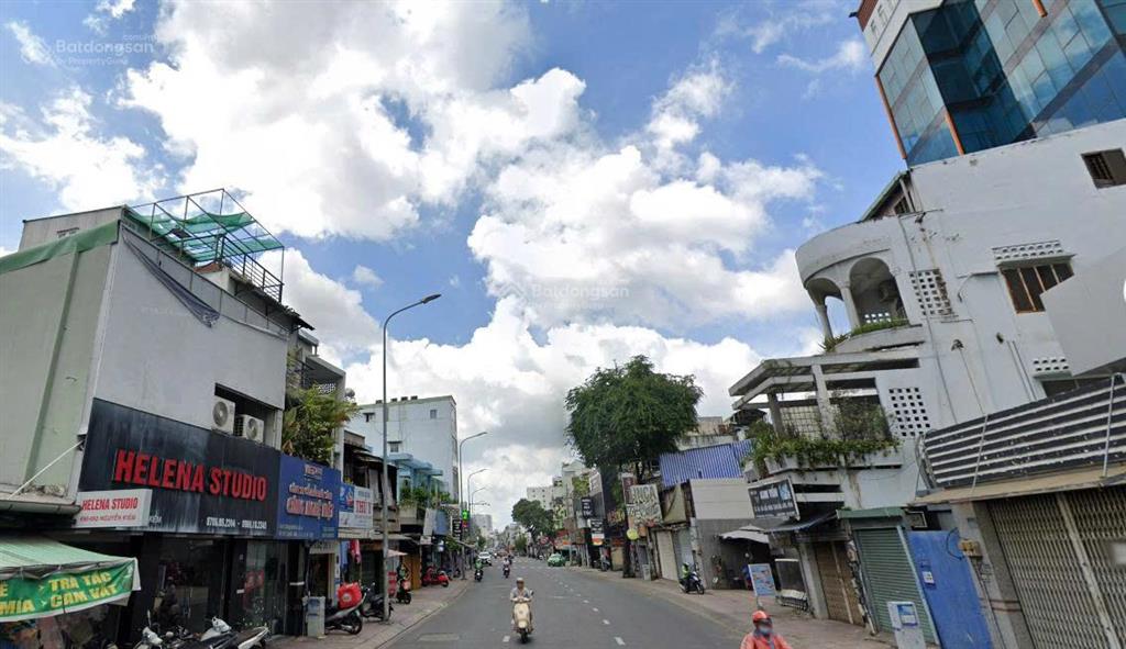 Cc bán gấp nhà 2 mt số 696 nguyễn kiệm, dt 5,2x15m,cn 69,7m2,đct 30 triệu giá 12 tỷ,  0919 818 ***