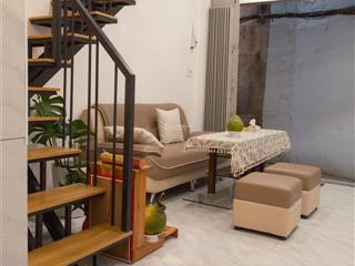 Cho thuê nhà 2 tầng  2 phòng, 1 phòng khách, 70m2 fullnt mới 100%, ban công , nguyễn cư trinh q1