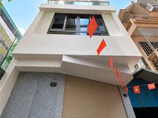 Đình thôn 55m 4 tầng thang máy ô tô đỗ cửa ngõ thông kd hơn 15 tỷ siêu phẩm trung