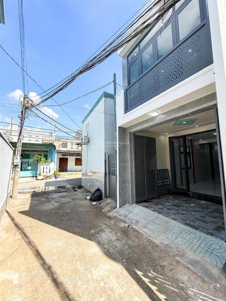 Bán nhà lầu p. tân phong gần chợ phúc hải đường xe hơi, dt 60m2, 3,2 tỷ,  0906 694 ***