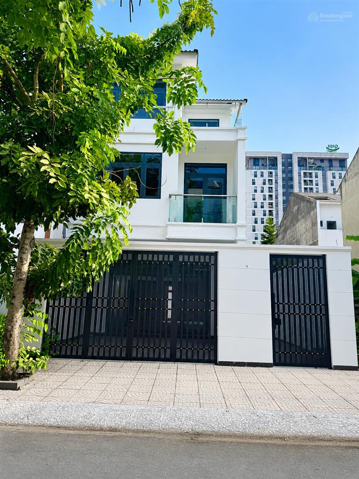 Bán biệt thự kdc phú hữu  khang an, dt 160m2 (8x20) nhà hoàn thiện ngoài, thô bên trong, sổ hồng