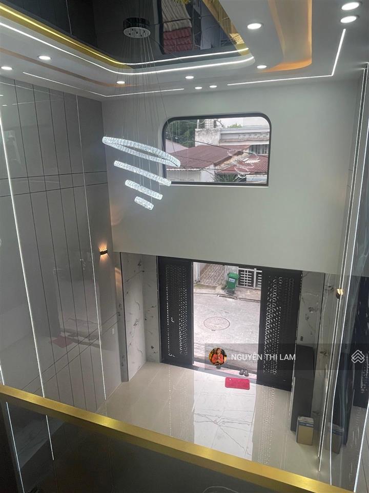 Bán nhà trung mỹ tây quận 12, nhà 5 tầng 4.5x16m gara ô tô 4pn 6wc sổ hồng riêng 6.99 tỷ